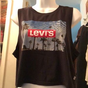Black no sleeve LEVI’S crop top.